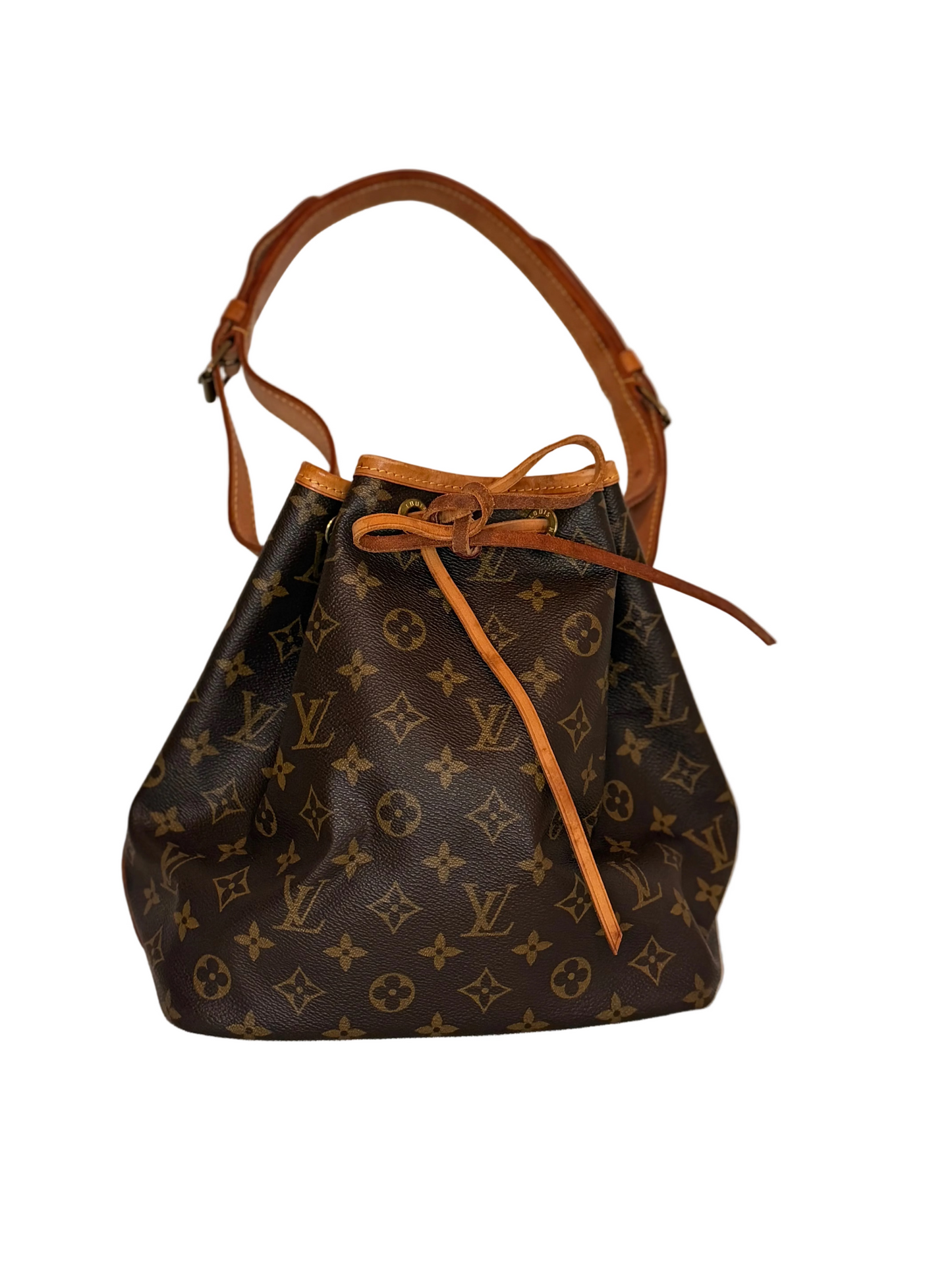 A Louis Vuitton monogram canvas bucket bag with brown leather trim and a single shoulder strap, displayed on a light beige textured surface against a plain off-white background.